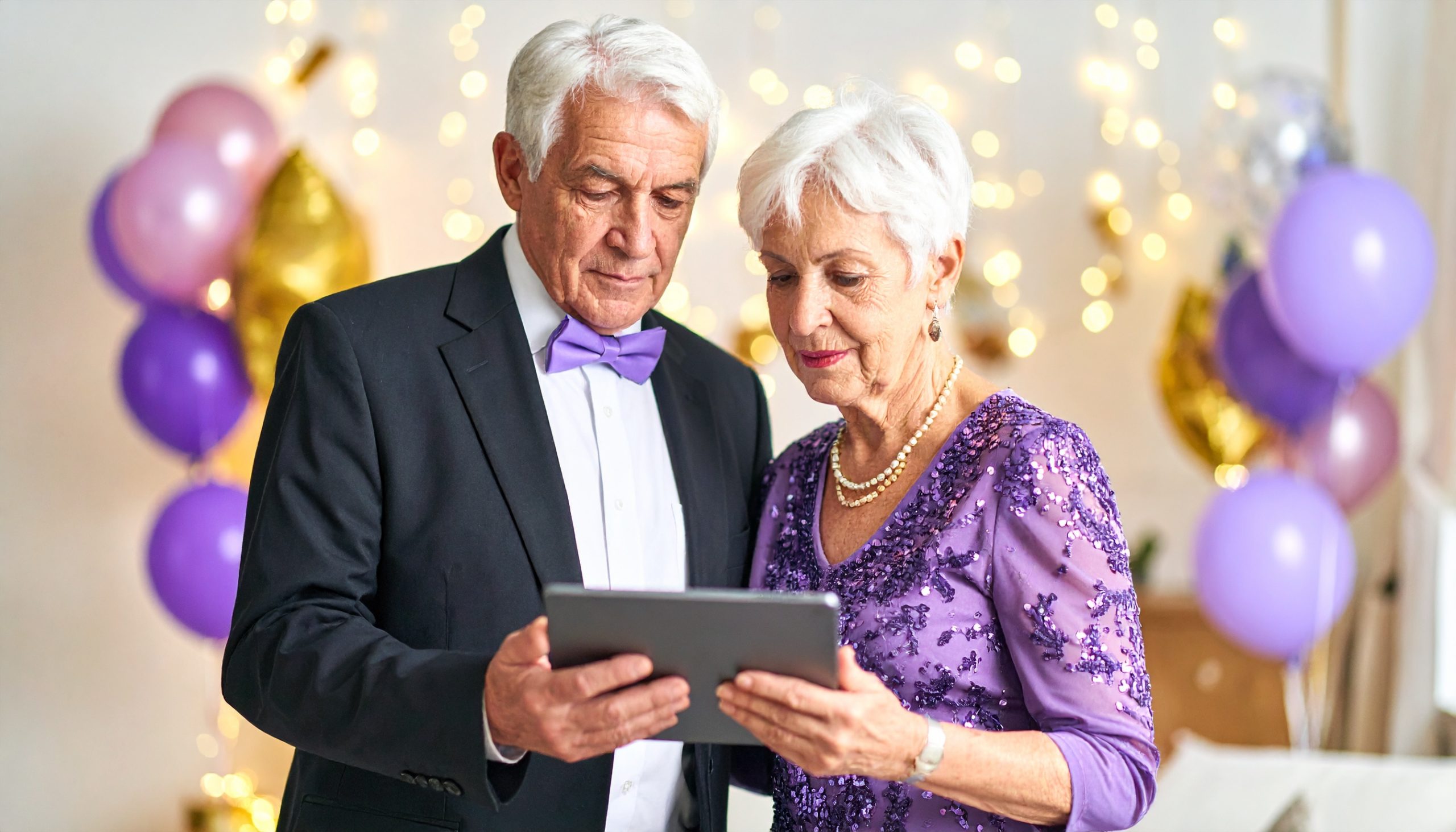 Couple dressed for a party.